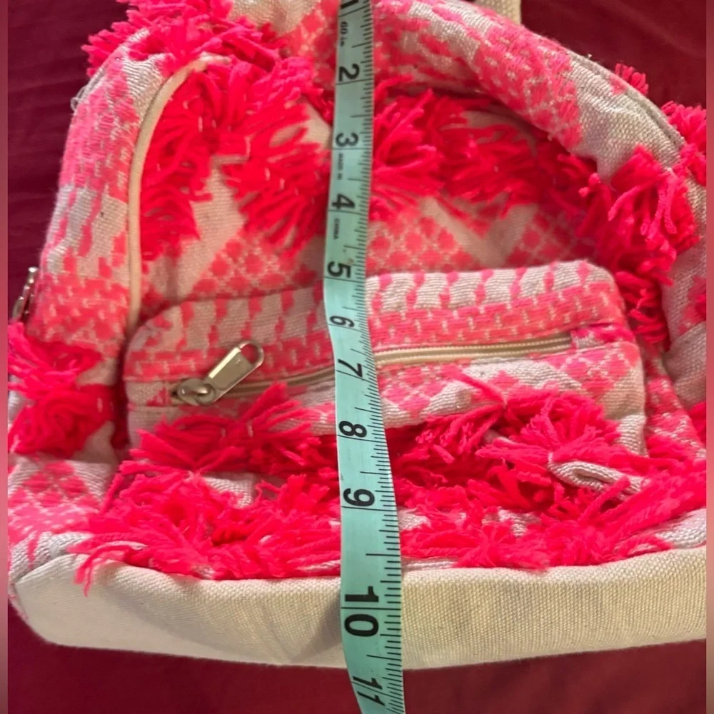 nwt- Stylish Hot Pink  Whimsical Fringe  asymmetrical design  Festival bag